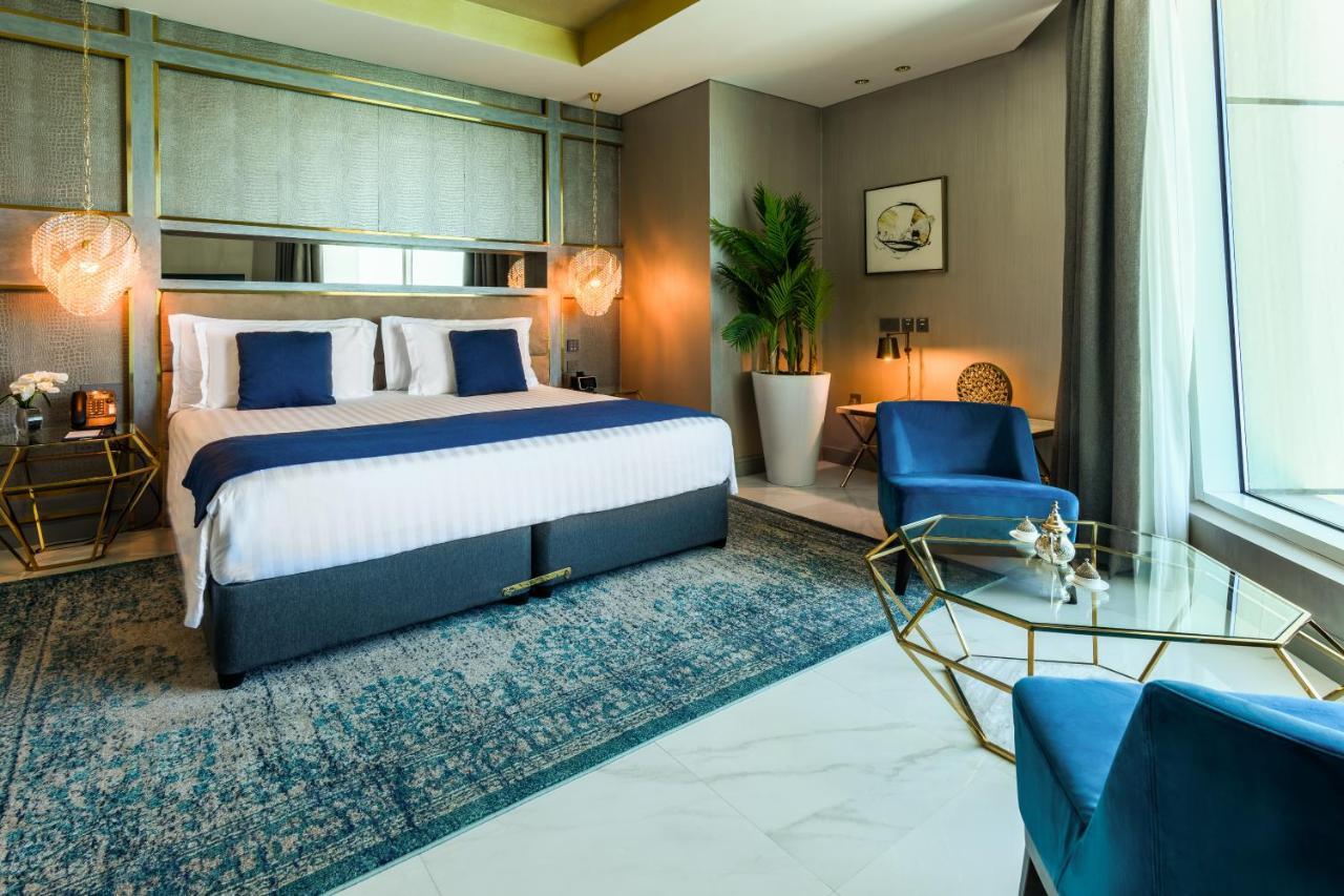 โรงแรมเซ็นทารา และเรสซิเดนซ์ เวสต์เบย์ โดฮา ภายนอก รูปภาพ Deluxe Room