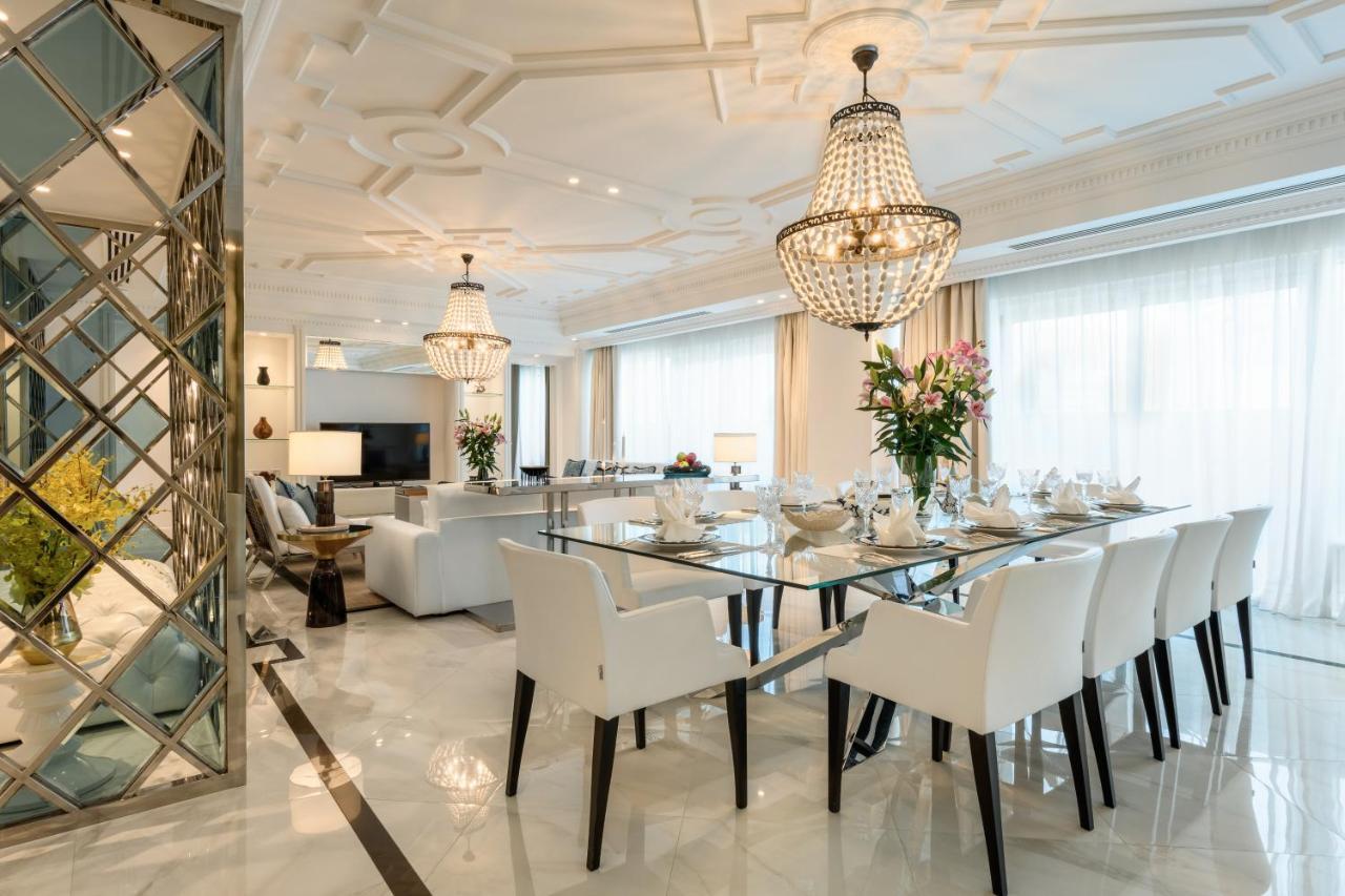 โรงแรมเซ็นทารา และเรสซิเดนซ์ เวสต์เบย์ โดฮา ภายนอก รูปภาพ A dining room