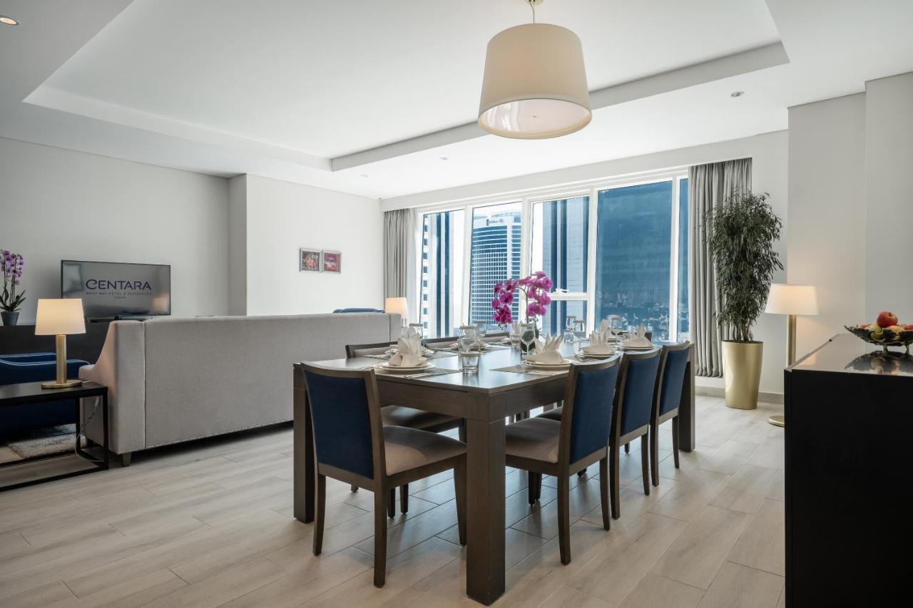 โรงแรมเซ็นทารา และเรสซิเดนซ์ เวสต์เบย์ โดฮา ภายนอก รูปภาพ A dining room at the Ritz-Carlton, DIFC