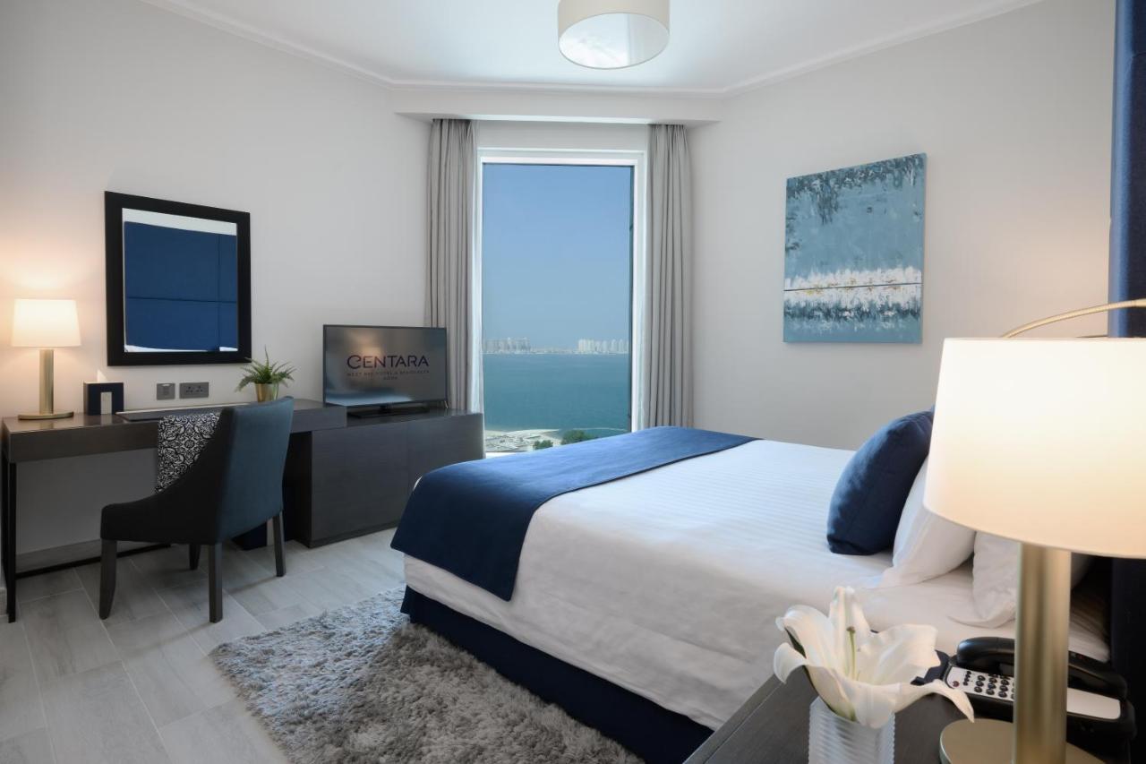 โรงแรมเซ็นทารา และเรสซิเดนซ์ เวสต์เบย์ โดฮา ภายนอก รูปภาพ A bedroom at the Ritz-Carlton, Bahrain