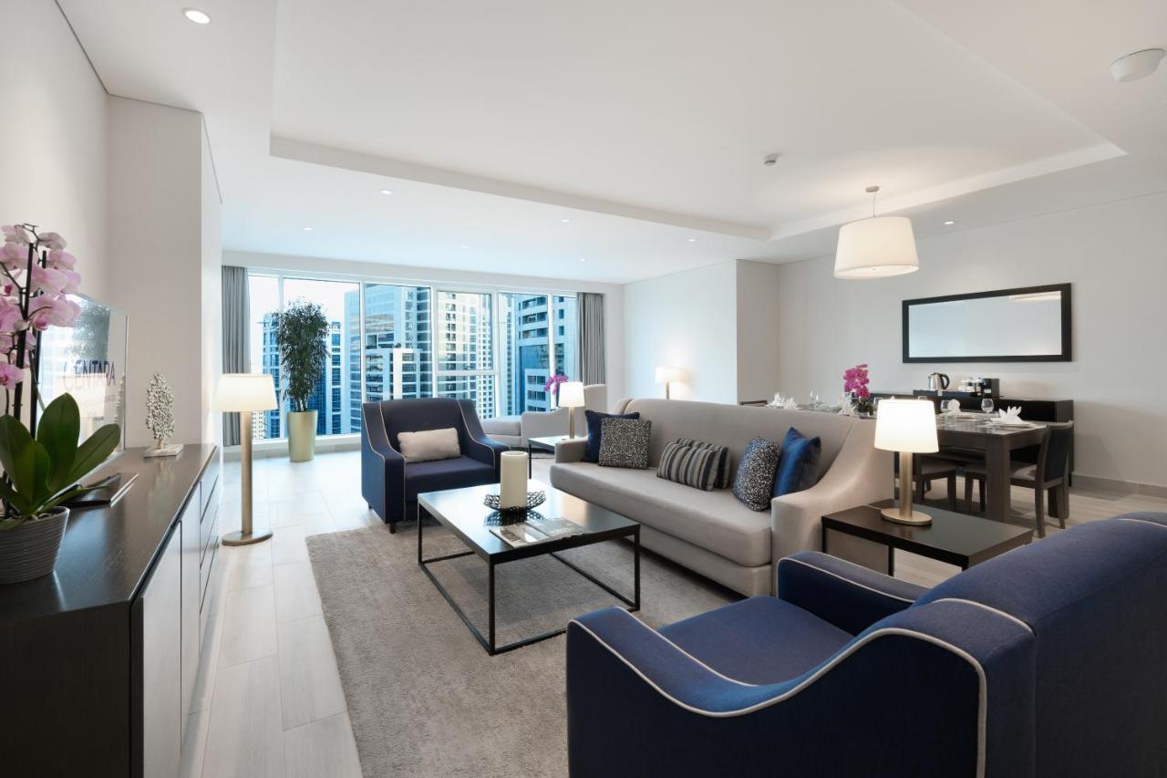 โรงแรมเซ็นทารา และเรสซิเดนซ์ เวสต์เบย์ โดฮา ภายนอก รูปภาพ A living room in a typical apartment