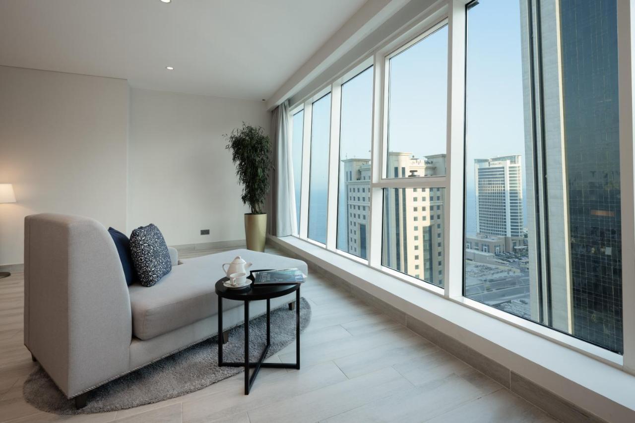 โรงแรมเซ็นทารา และเรสซิเดนซ์ เวสต์เบย์ โดฮา ภายนอก รูปภาพ A view from a residential apartment